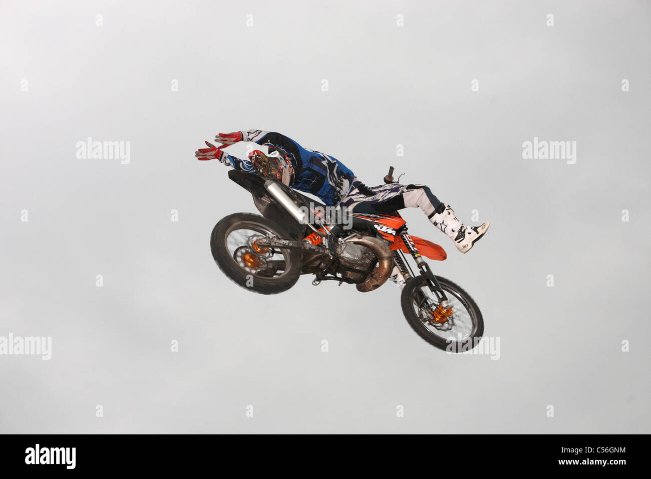 Freestyle Moto FMX riders in mid air Stock Photo