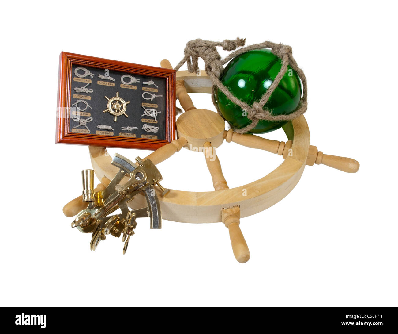 Ship wheel with boater knots sextant and a glass float Stock Photo Alamy