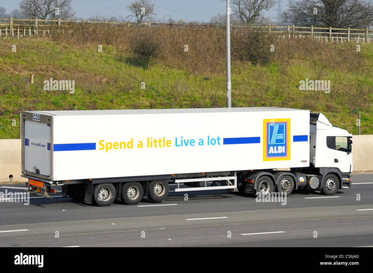 Aldi supermarket delivery trailer and lorry with advertising and logo Stock Photo