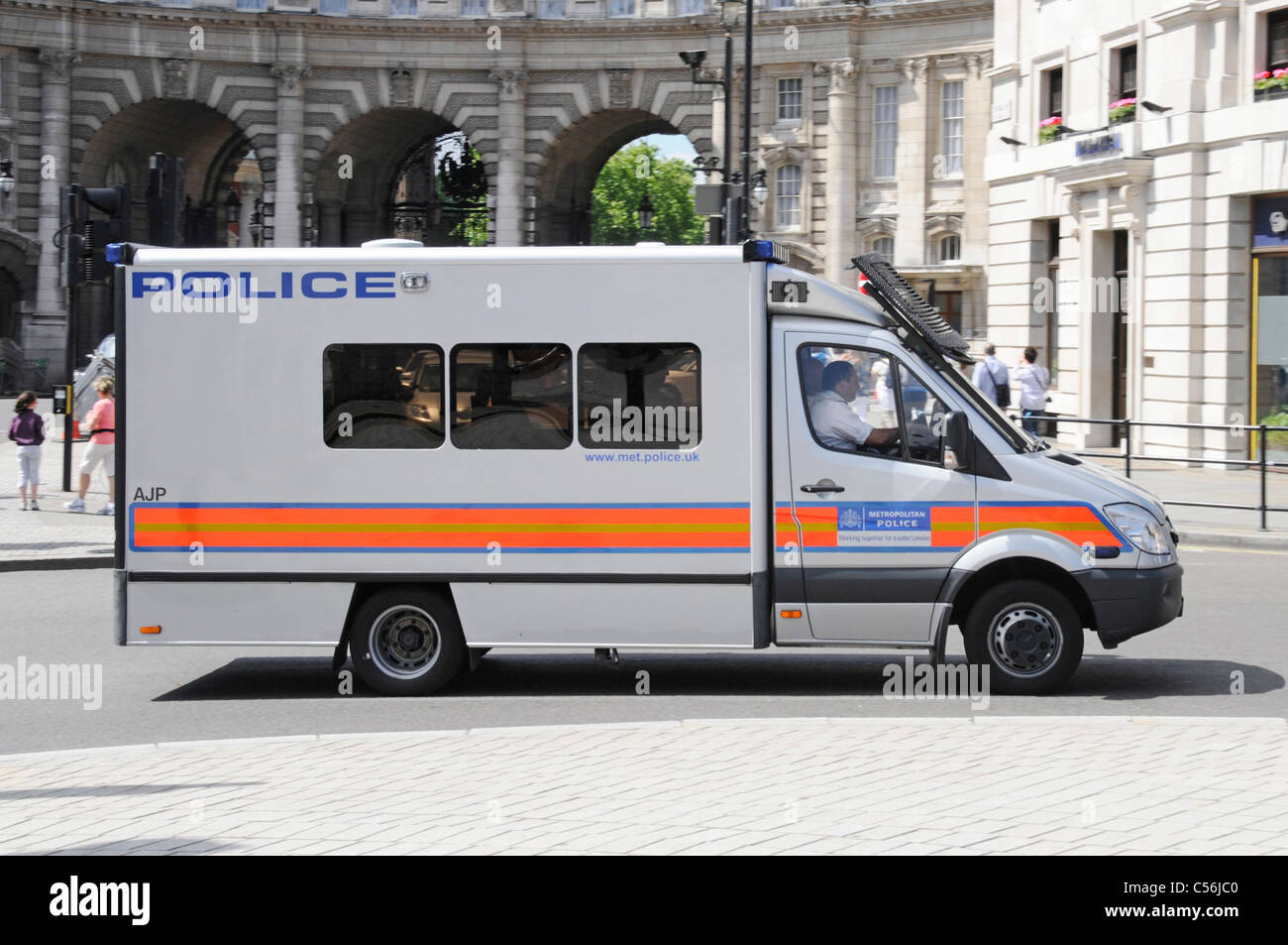 Metropolitan police personnel carrier transport and driver Trafalgar Square London England UK Stock Photo