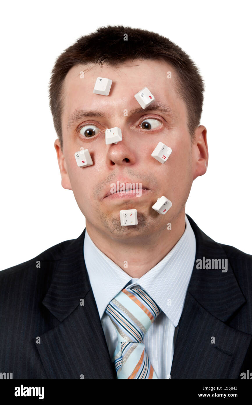 word STUPID vylodennoe buttons on the face of businessman on white background Stock Photo