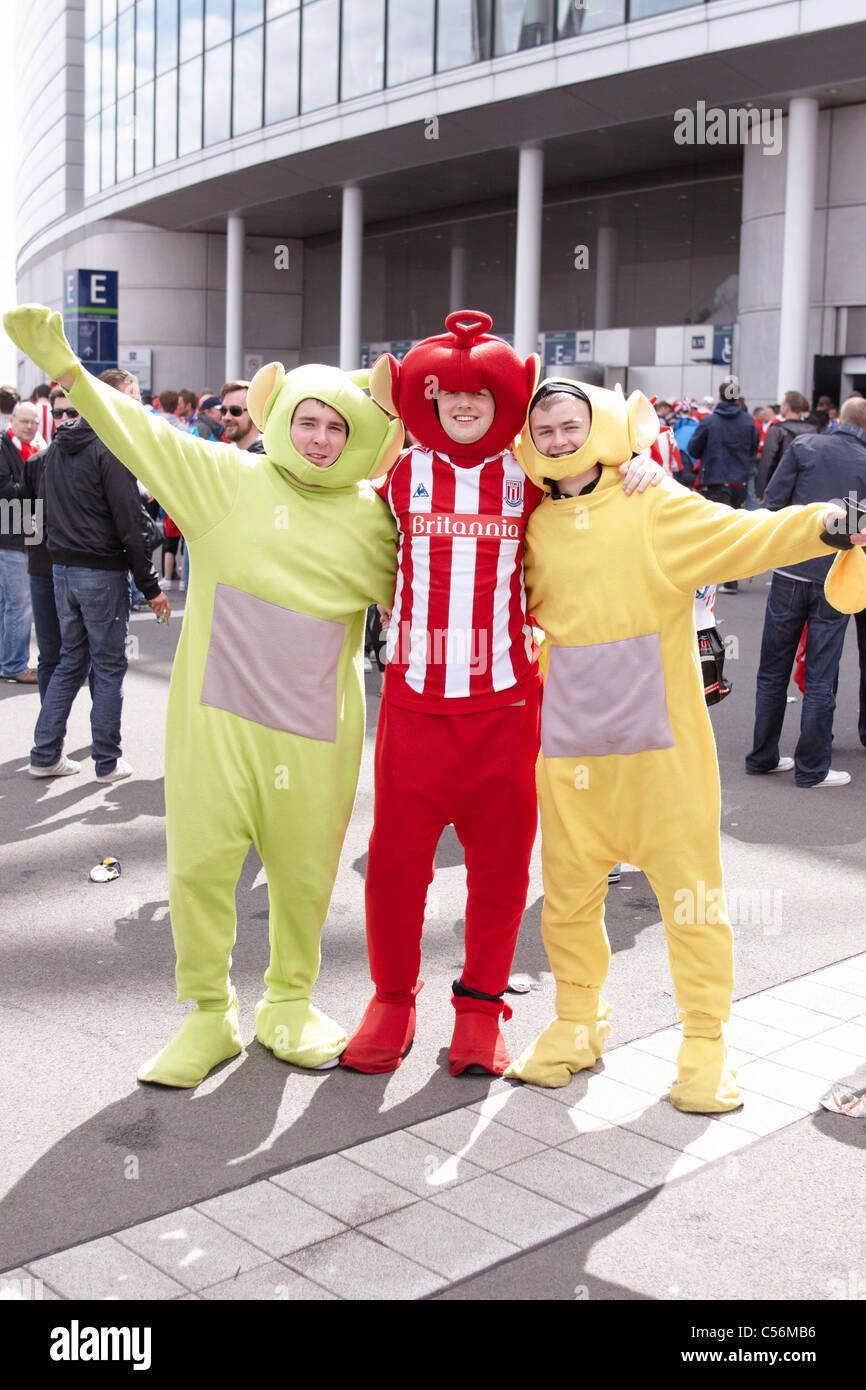 Stoke City (red) and Manchester City (light blue) fans at the 2011 FA Cup Final held at Wembley Stadium in London Stock Photo