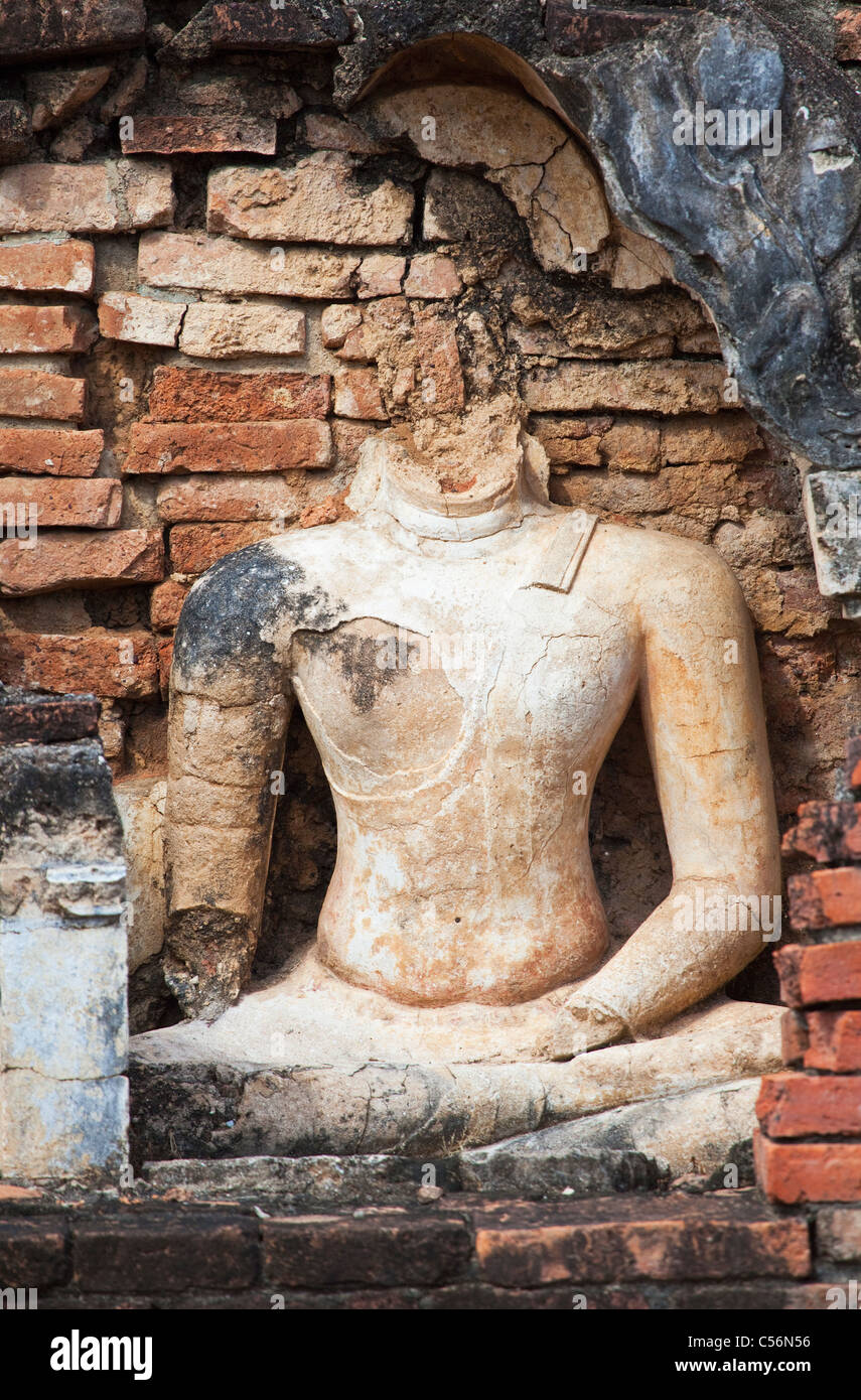 Decapitated Statue of a Buddha at Sukhothai Historical Park, Thailand Stock Photo