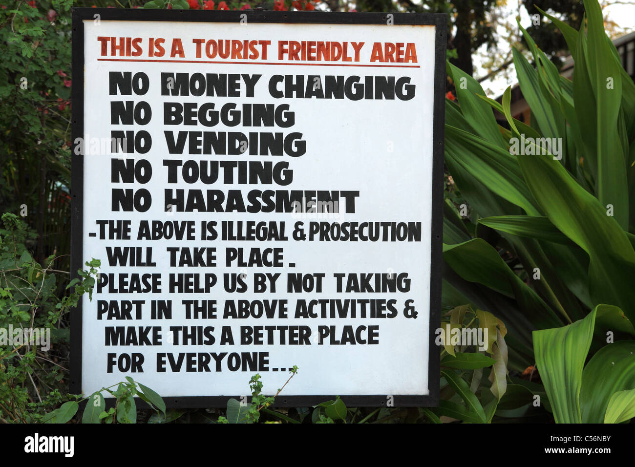 A sign states this is a 'tourist friendly area' in Victoria Falls, Zimbabwe. Stock Photo