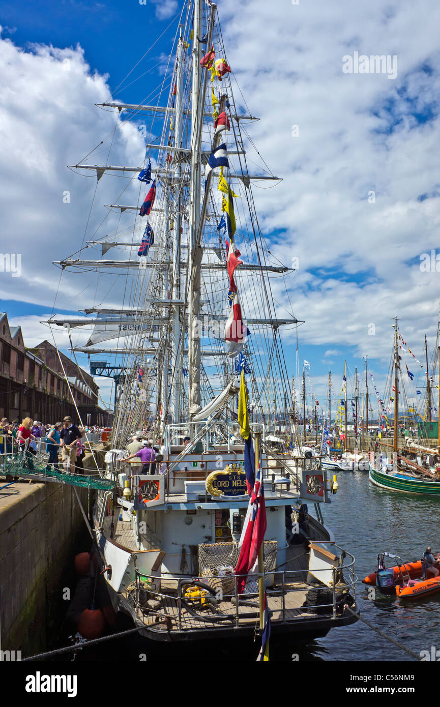 Sailing ship S.T.S. lord Nelson participating in the Tall Ships Races 2011 moored in James Watt Dock Greenock harbour Scotland Stock Photo