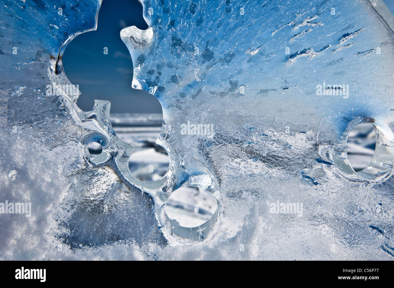 The Netherlands, Oosterdijk, CU piece of ice on frozen lake called IJsselmeer. Stock Photo