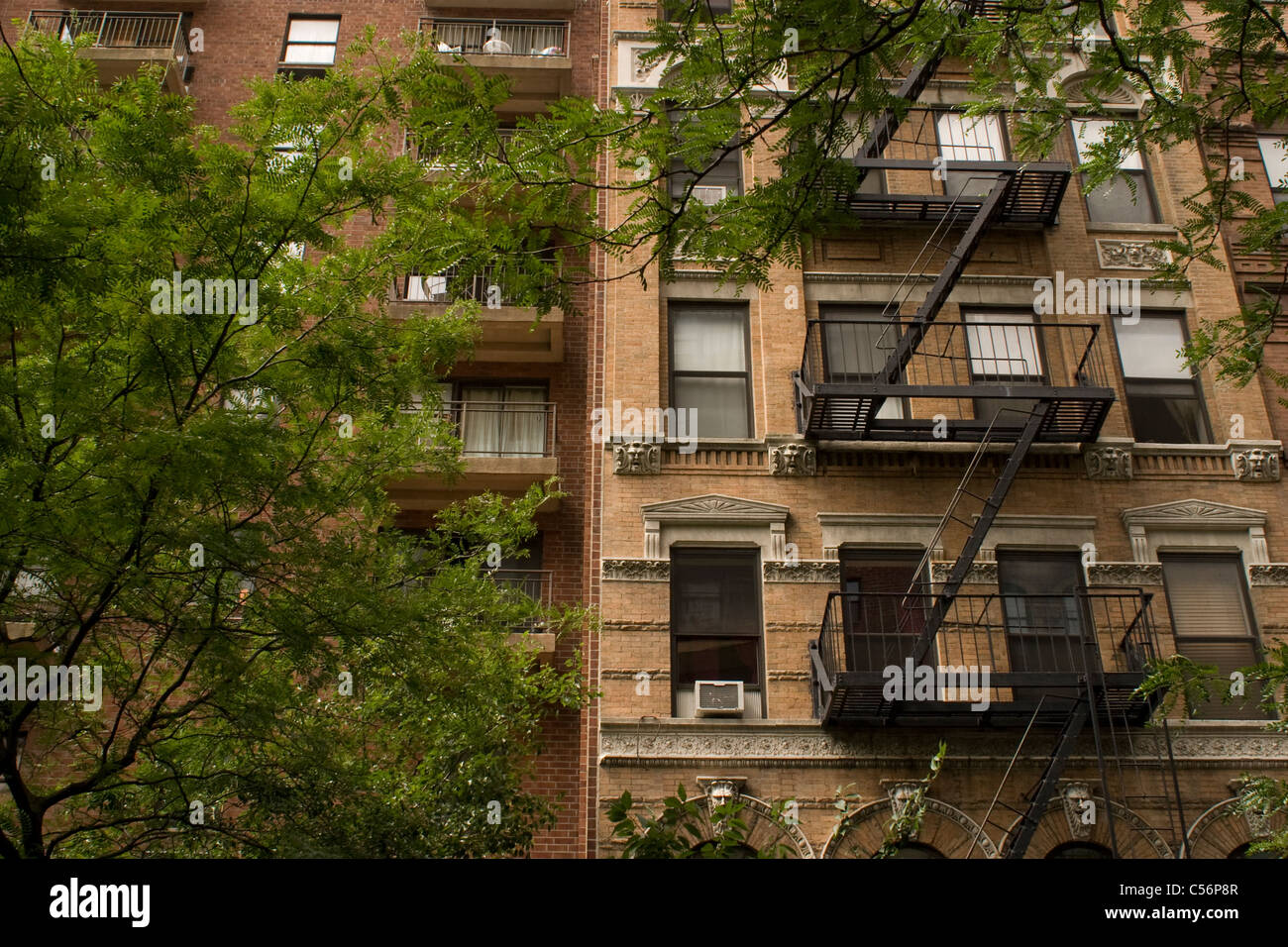 A midtown Manhattan apartment building has fire escape on the front of