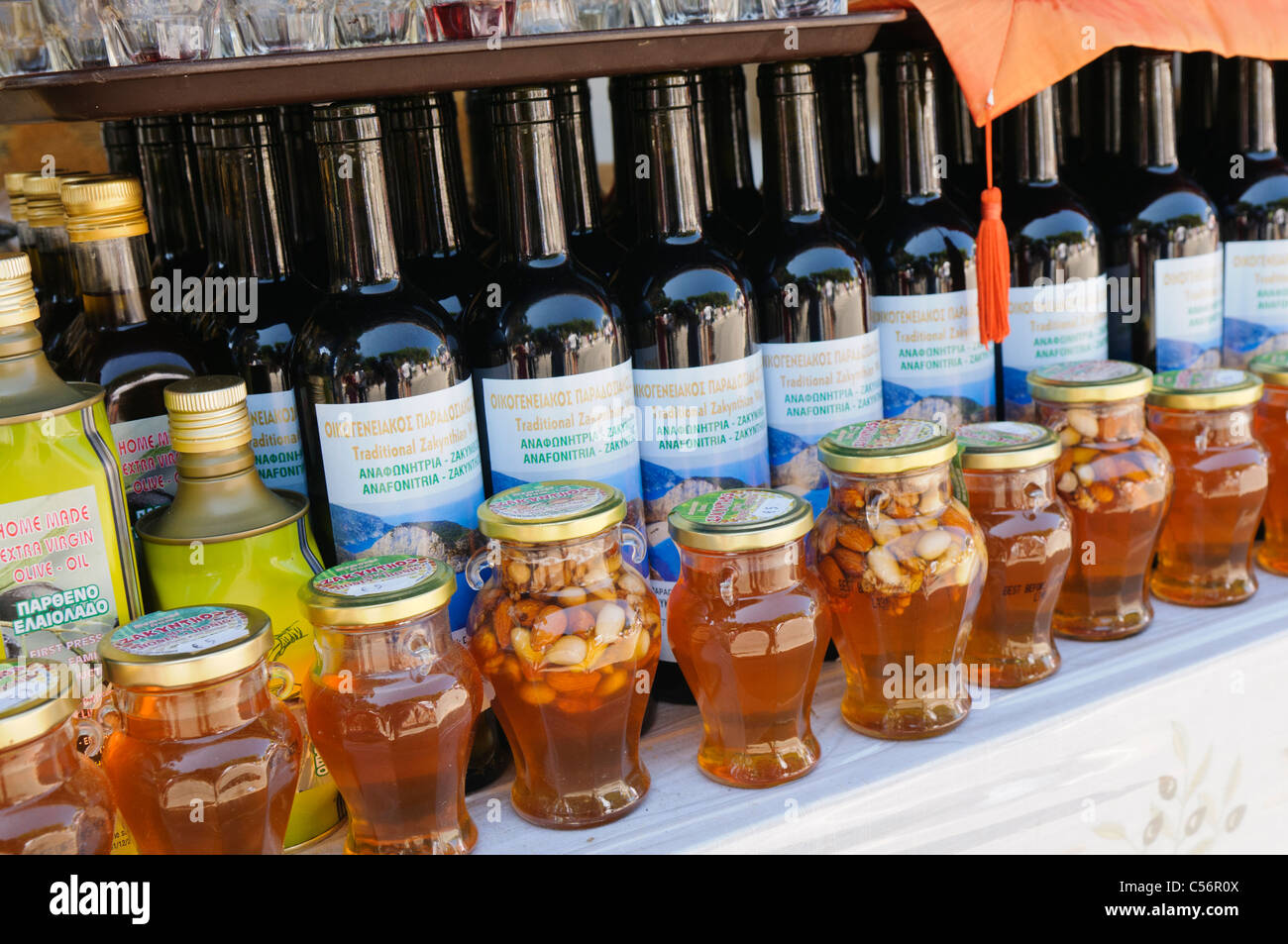 Local Greek produce on sale in Zakynthos including red wine, olive oil