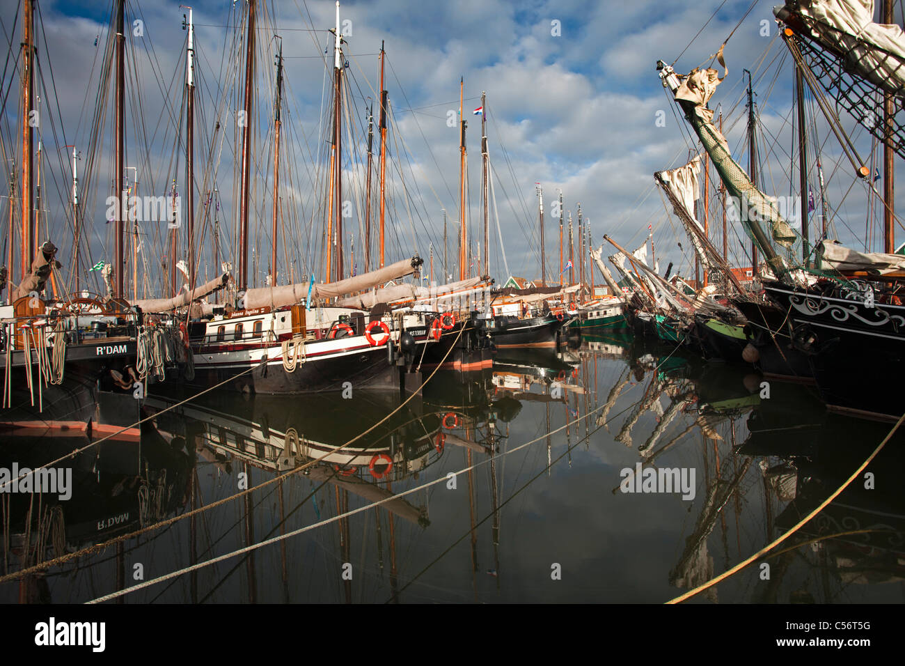 The Netherlands, Volendam, traditional sailing ships in harbour. Stock Photo