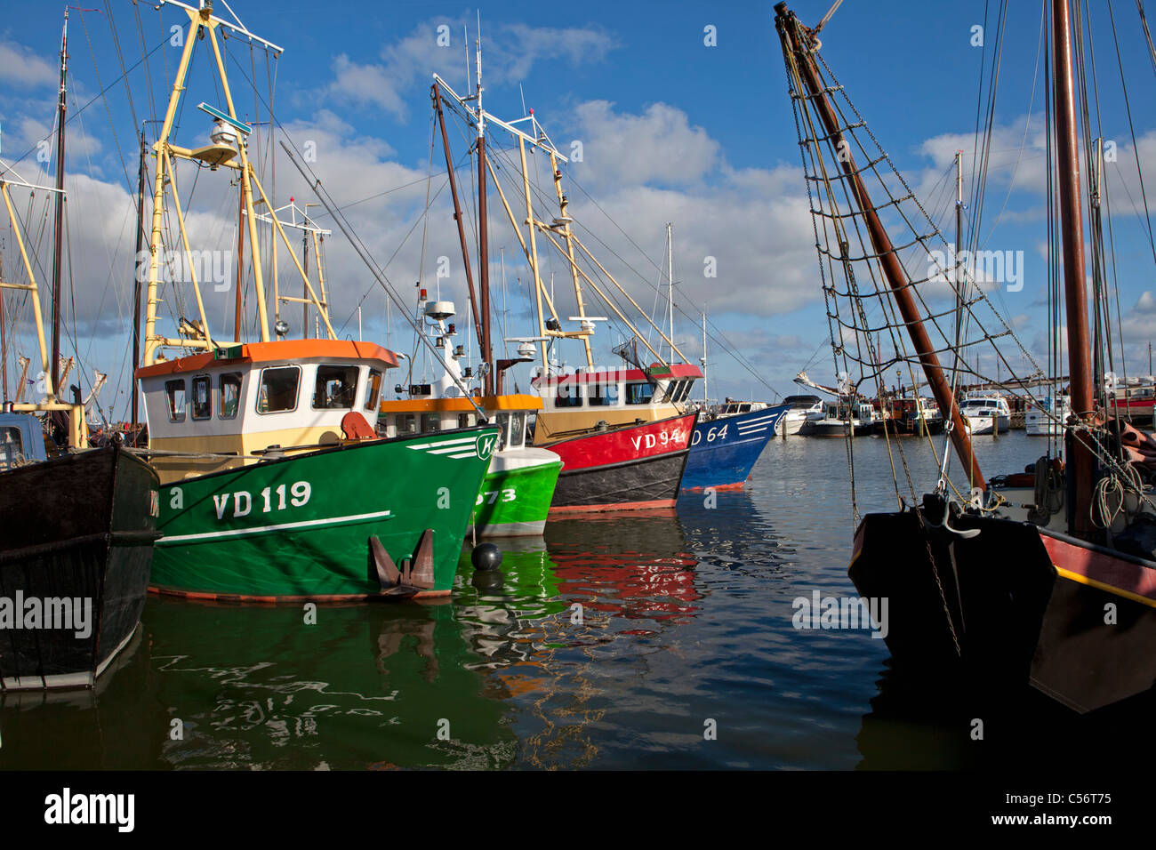 The Netherlands, Volendam, Fishing ships in harbour. Stock Photo