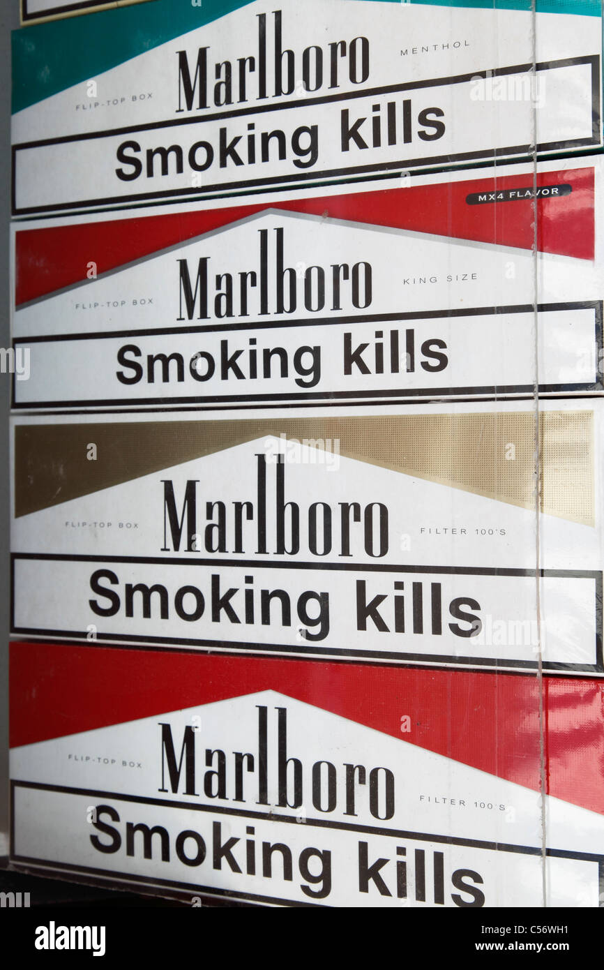 Marlboro cigarettes with print 'smoking kills' in a duty free shop Stock Photo