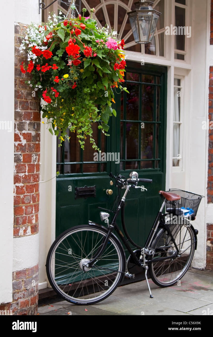 Bicycle outside a store in Winchester, Hampshire Stock Photo