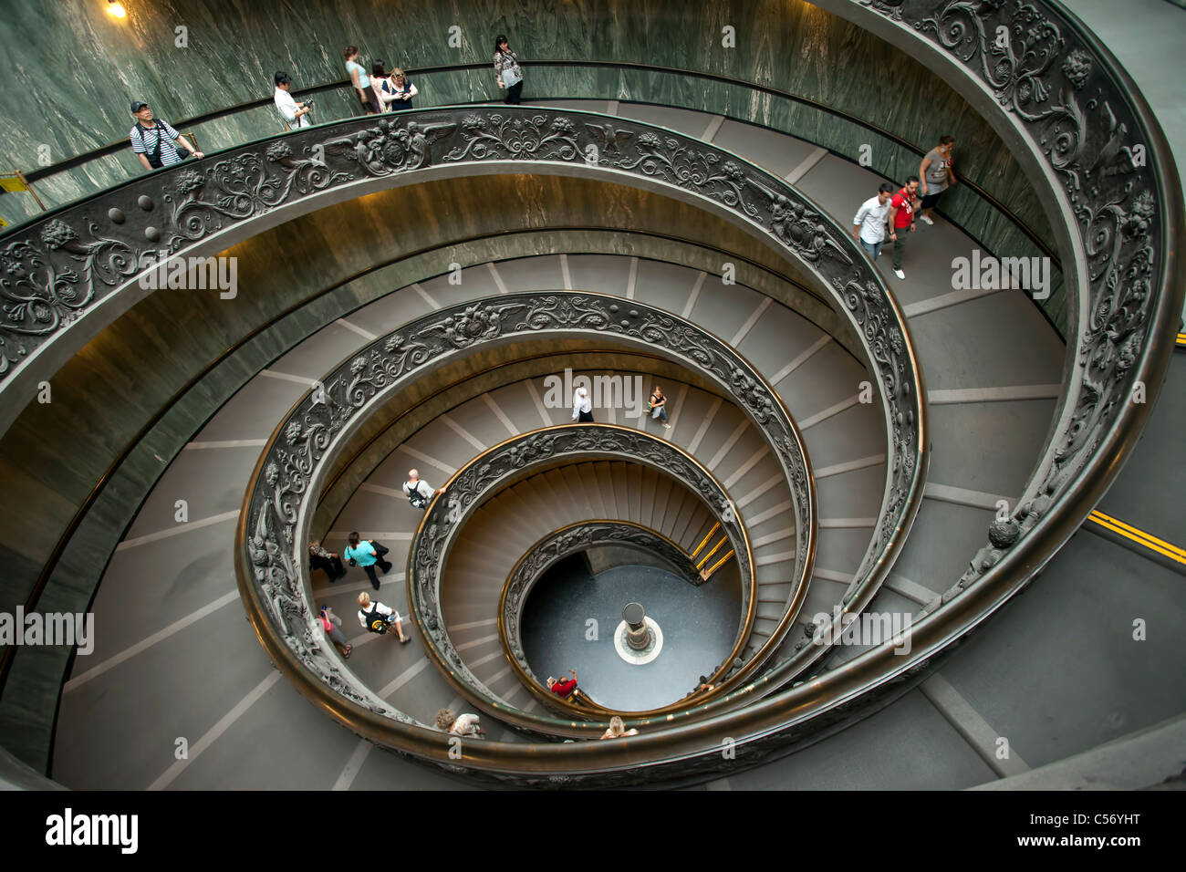 Vatican museum famous spiral ramp from upper floors to ground level, top to bottom. Double spiral walkway for tourists. Stock Photo