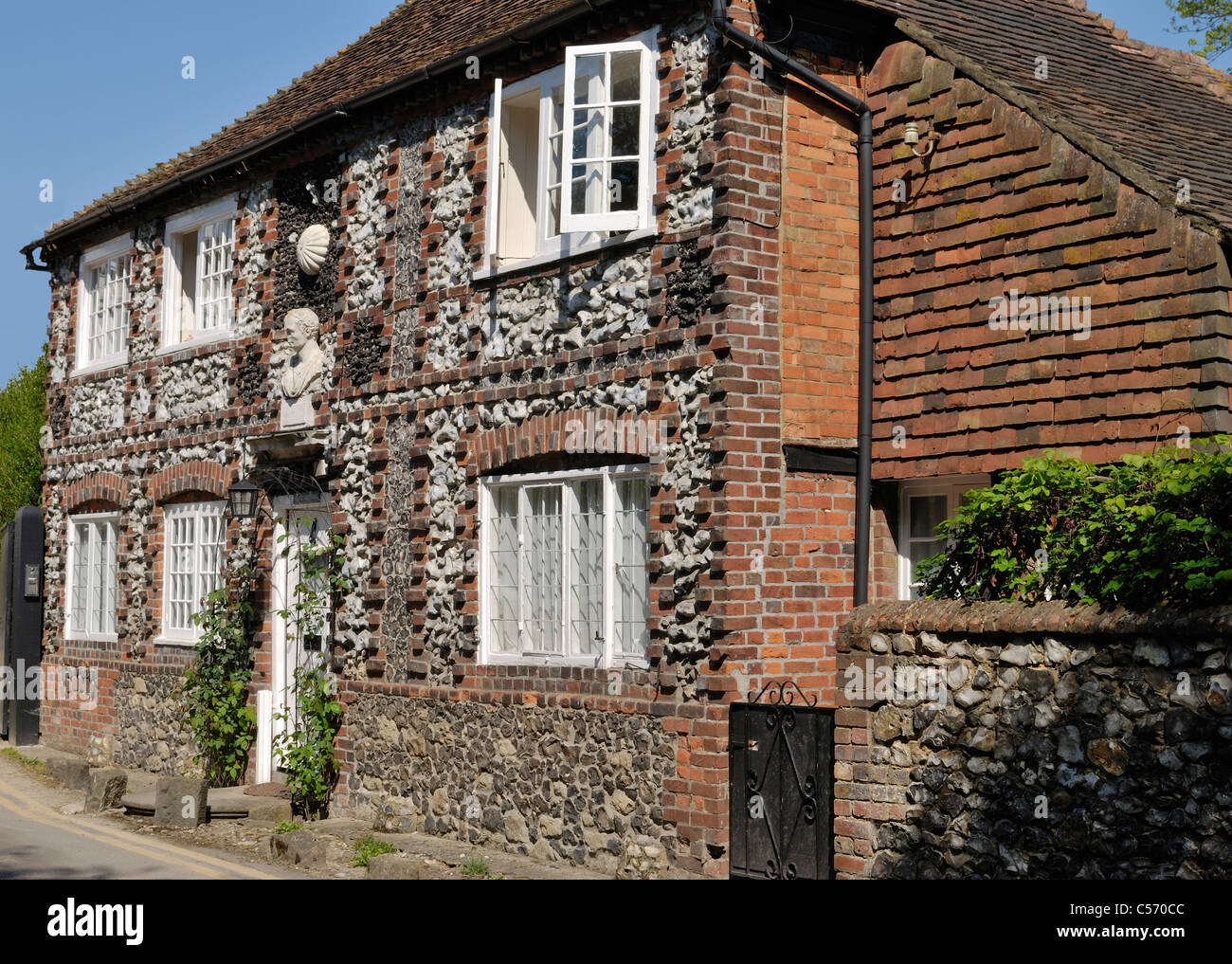 Brick and flintstone cottage in the village of Shoreham. Kent. England Stock Photo
