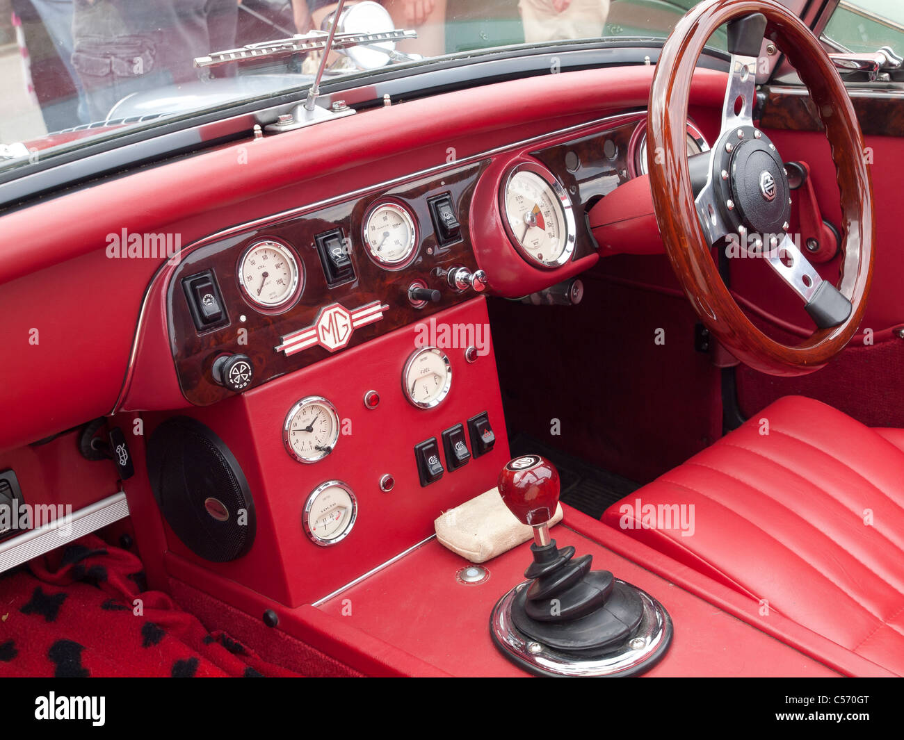 Driving compartment of a Sebring Racing converted MG Midget Sports Car at a seaside rally Stock Photo