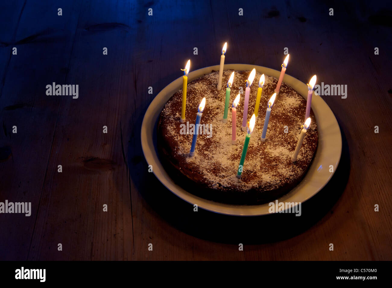 Home-made birthday cake with twelve candles Stock Photo