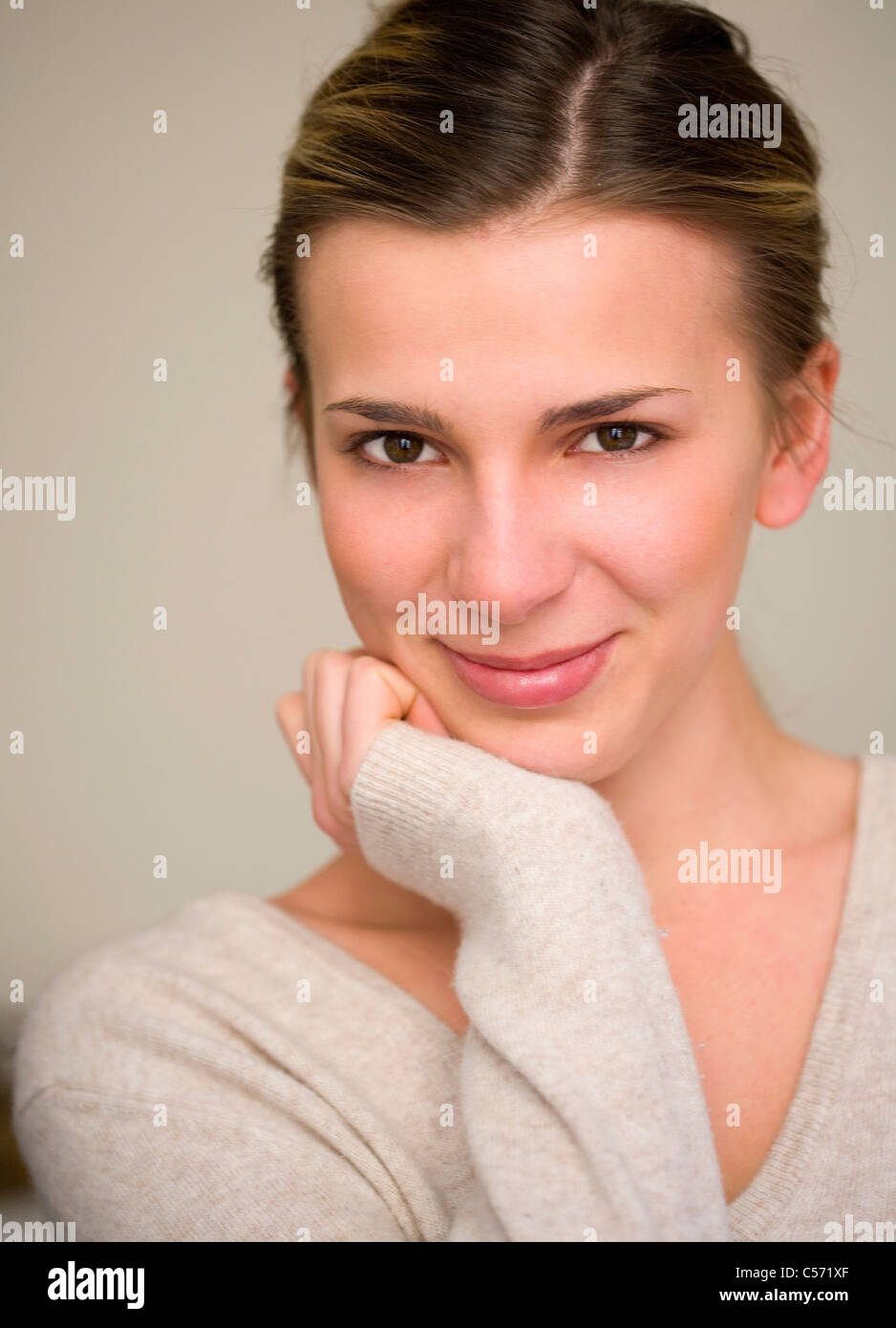 Woman hand on chin hi-res stock photography and images - Alamy
