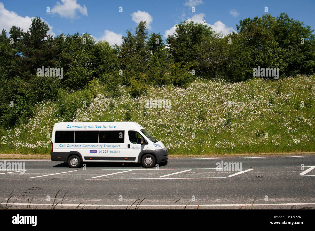 Mini bus on A685, busy rural road. Stock Photo