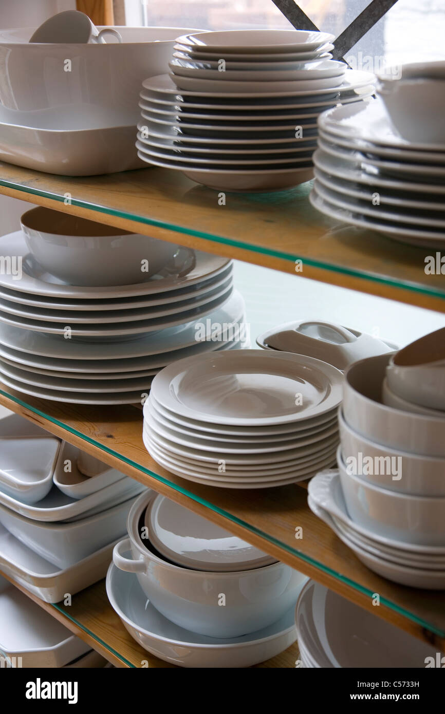 White crockery on shelves Stock Photo