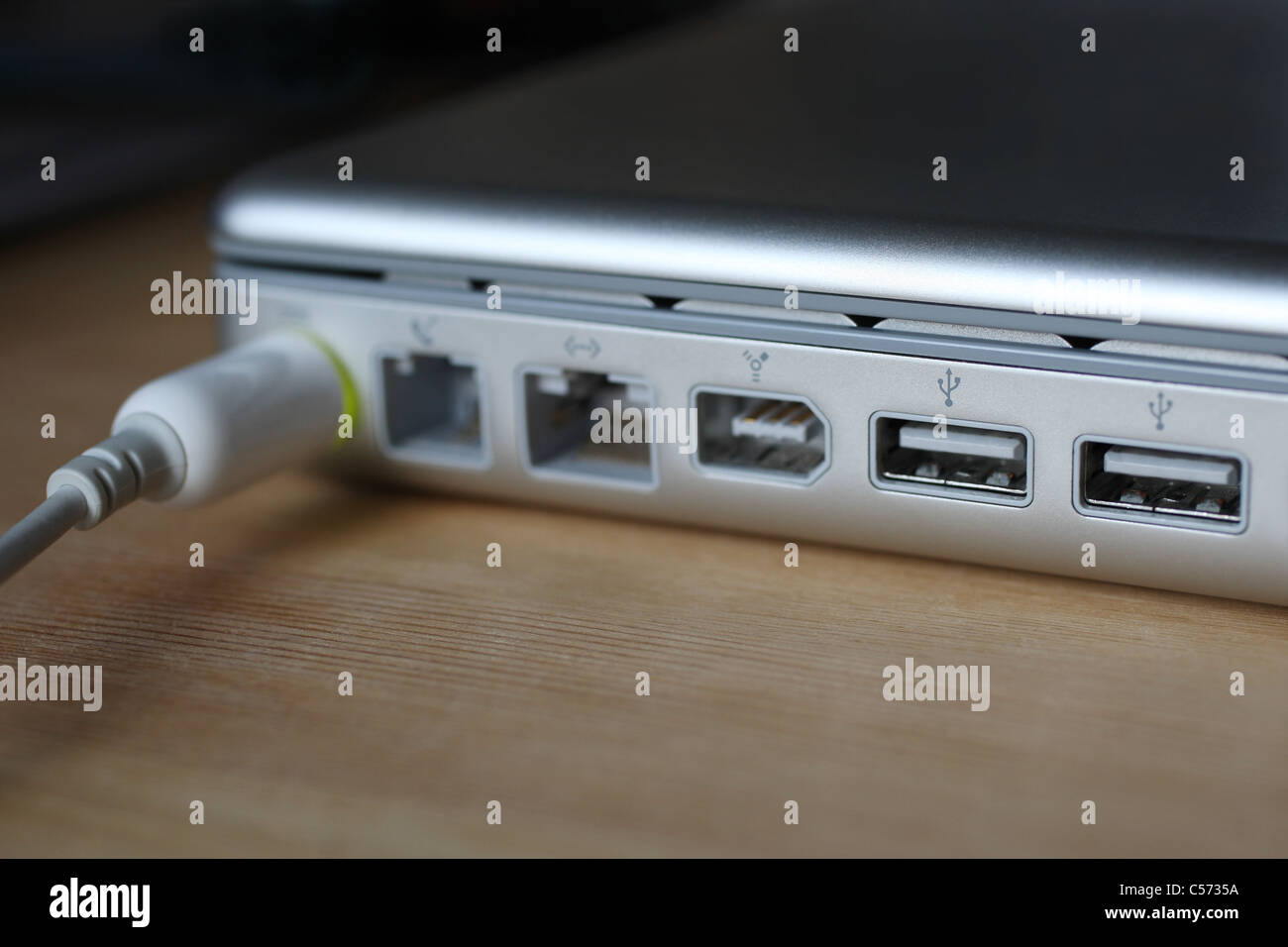 Apple PowerBook G4 Laptop USB 2.0 Ports, power adapter port. Stock Photo