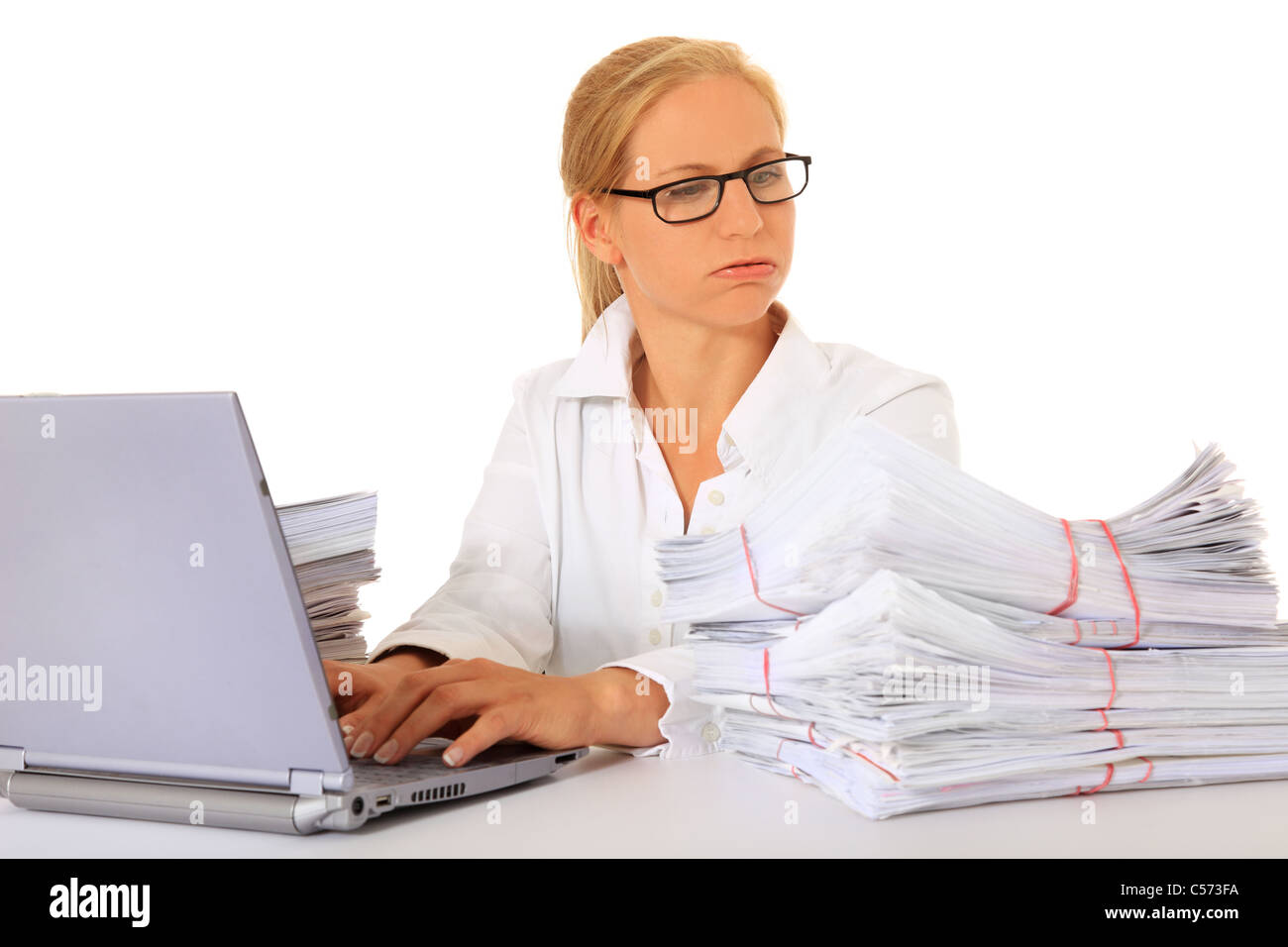 Attractive businesswoman working. All on white background. Stock Photo
