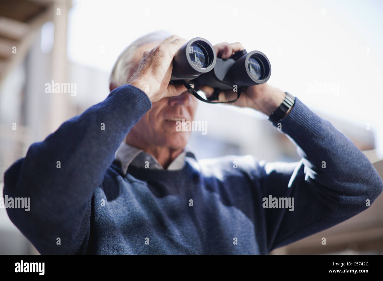Man Binoculars Spying High Resolution Stock Photography and Images - Alamy