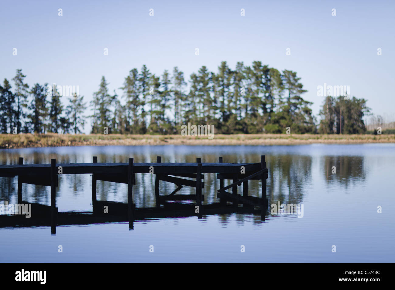 Jetty over rural lake Stock Photo - Alamy