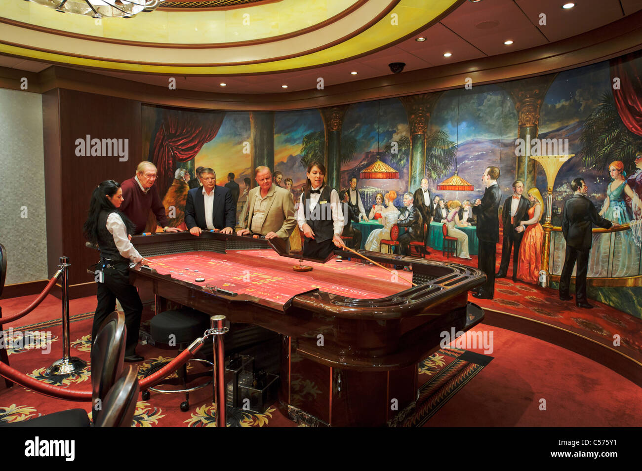 Passengers on the Queen Mary 2 engaged in craps game in the Empire Casino  Stock Photo - Alamy