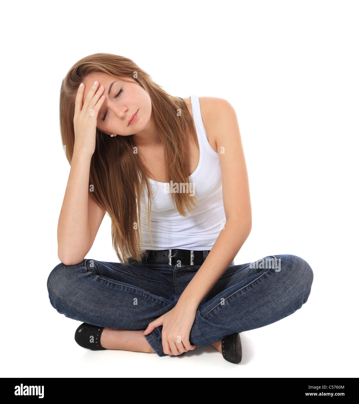 Full length shot of a frustrated young woman. All on white background. Stock Photo