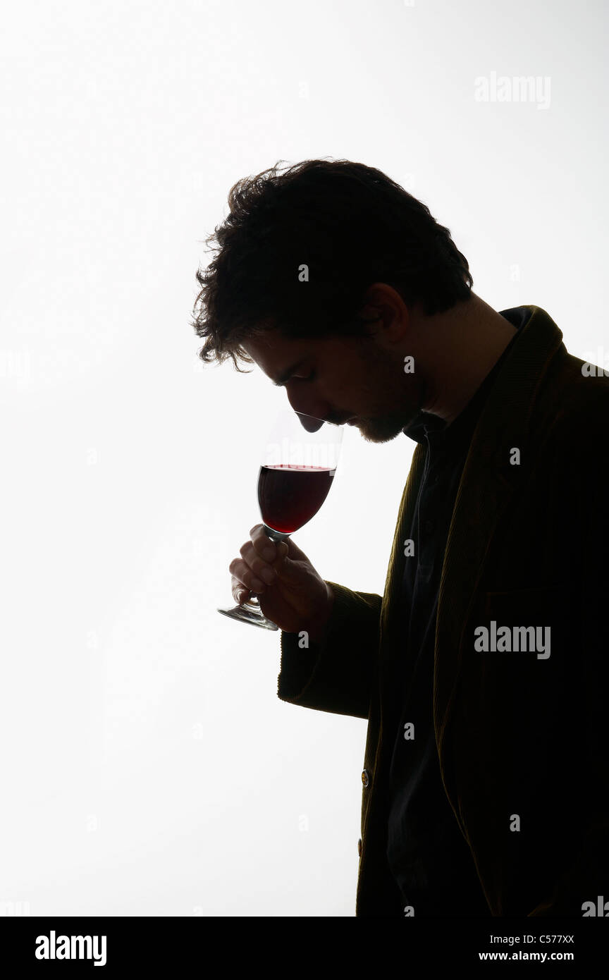 Man drinking glass of wine Stock Photo - Alamy