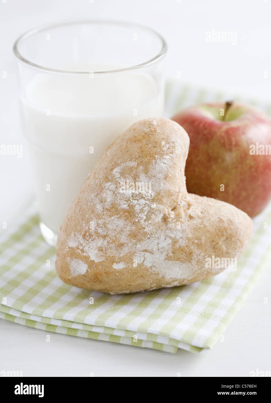 Bread roll and apple with milk Stock Photo