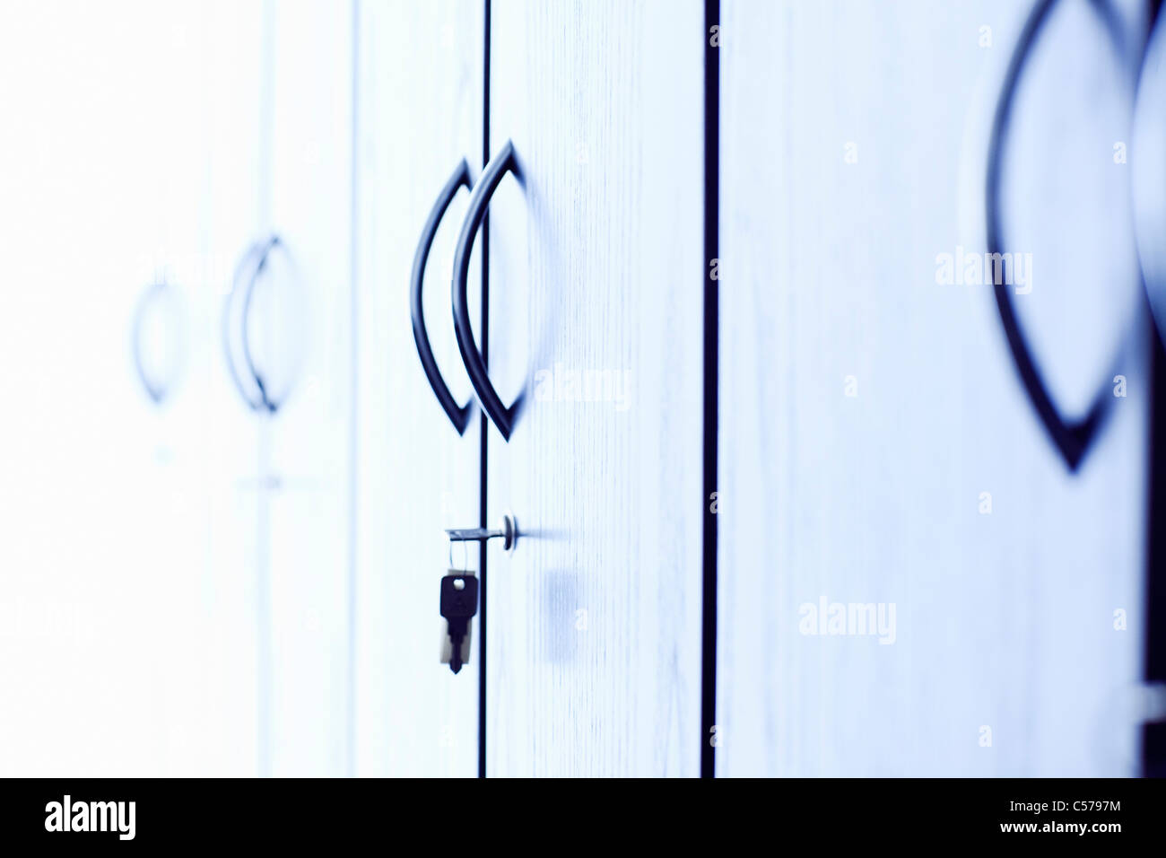 Keys in lock of office Stock Photo Alamy