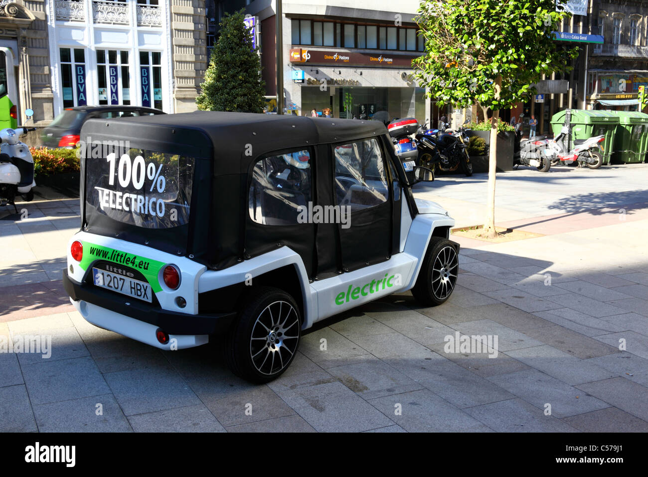 Small Little 4 electric car parked in street, Vigo , Galicia , Spain Stock Photo