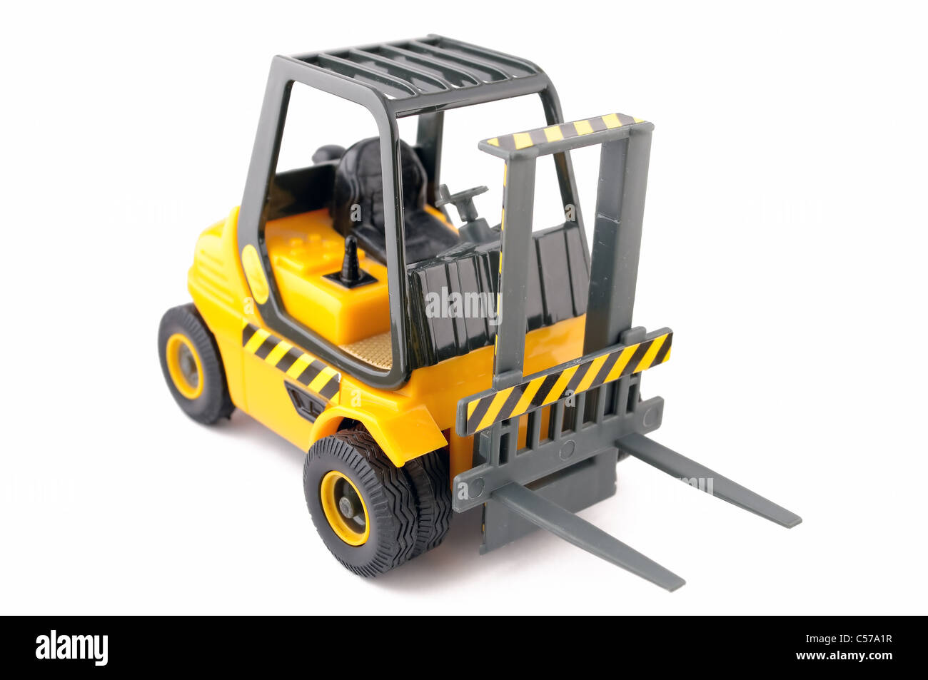 Yellow toy forklift isolated on white background Stock Photo