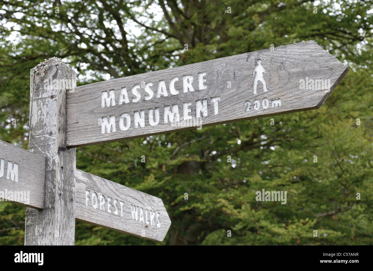 A signpost in Glencoe village directs visitors to the Massacre Monument. Stock Photo