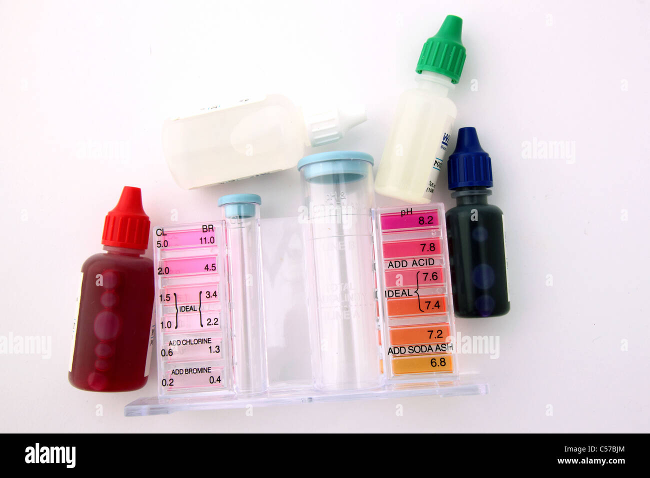 SWIMMING POOL TEST KIT WITH AND WITHOUT CHEMICALS CUT OUT IN FRONT OF