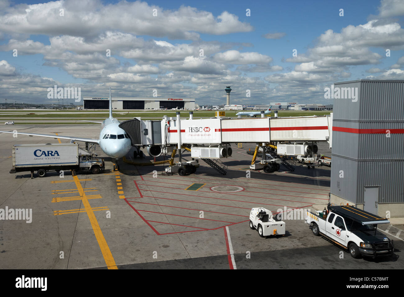 air canada aircraft and airport vehicles Toronto Pearson International Airport Ontario Canada Stock Photo