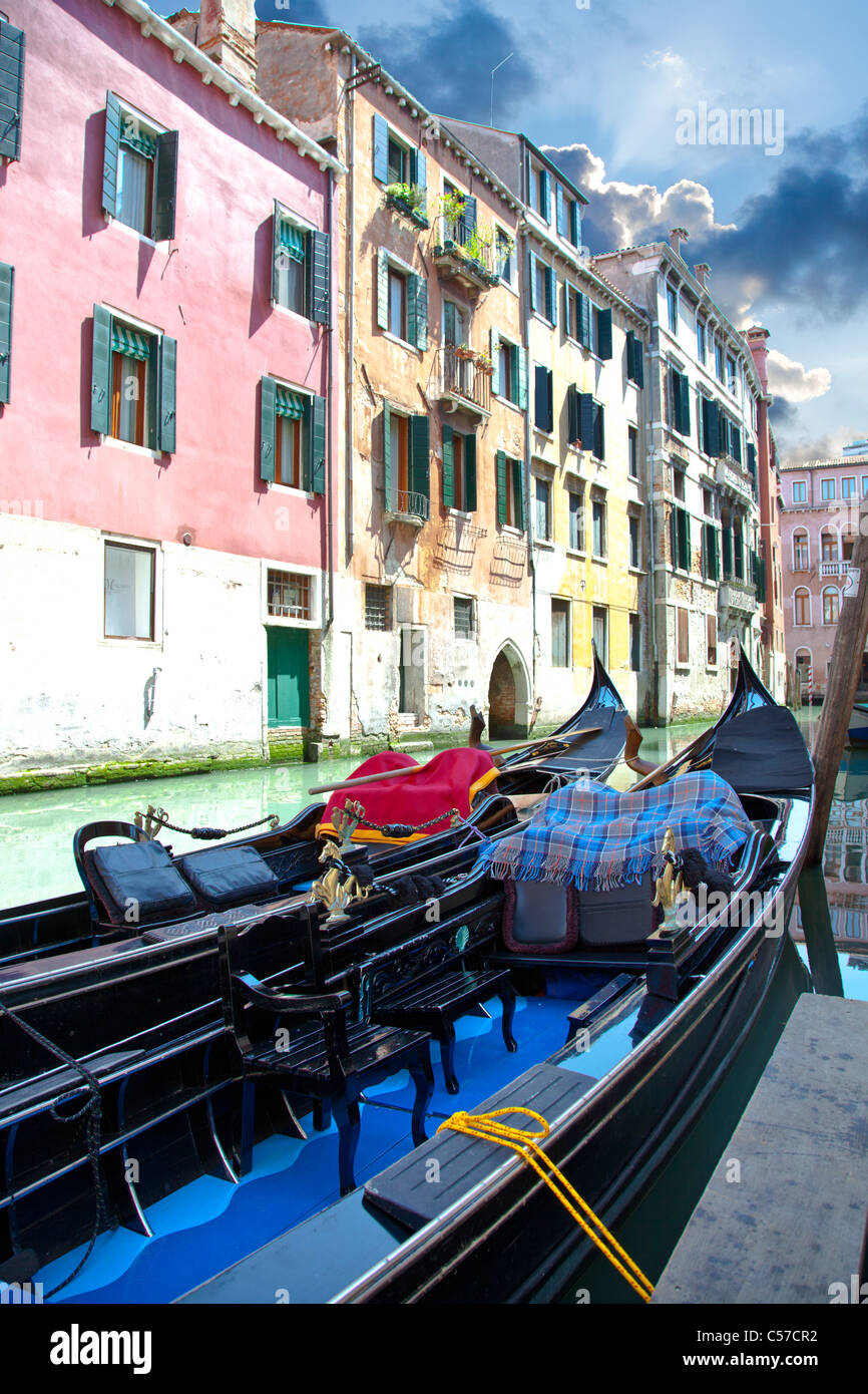 Black gondola in canal Venice in Italy Stock Photo