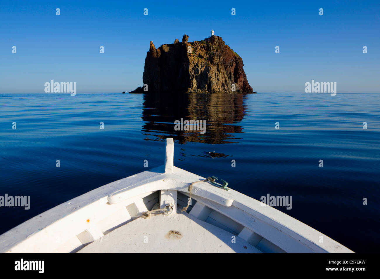 Strombolicchio, Italy, Europe, Lipari Islands, island, isle, volcano chimney, volcano rest, sea, Mediterranean Sea, boat Stock Photo