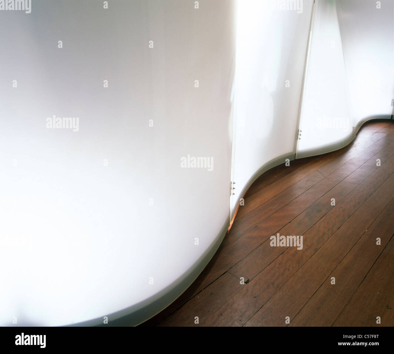 studio-flat-with-illuminated-kitchen-2004-wave-form-kitchen-cabinets