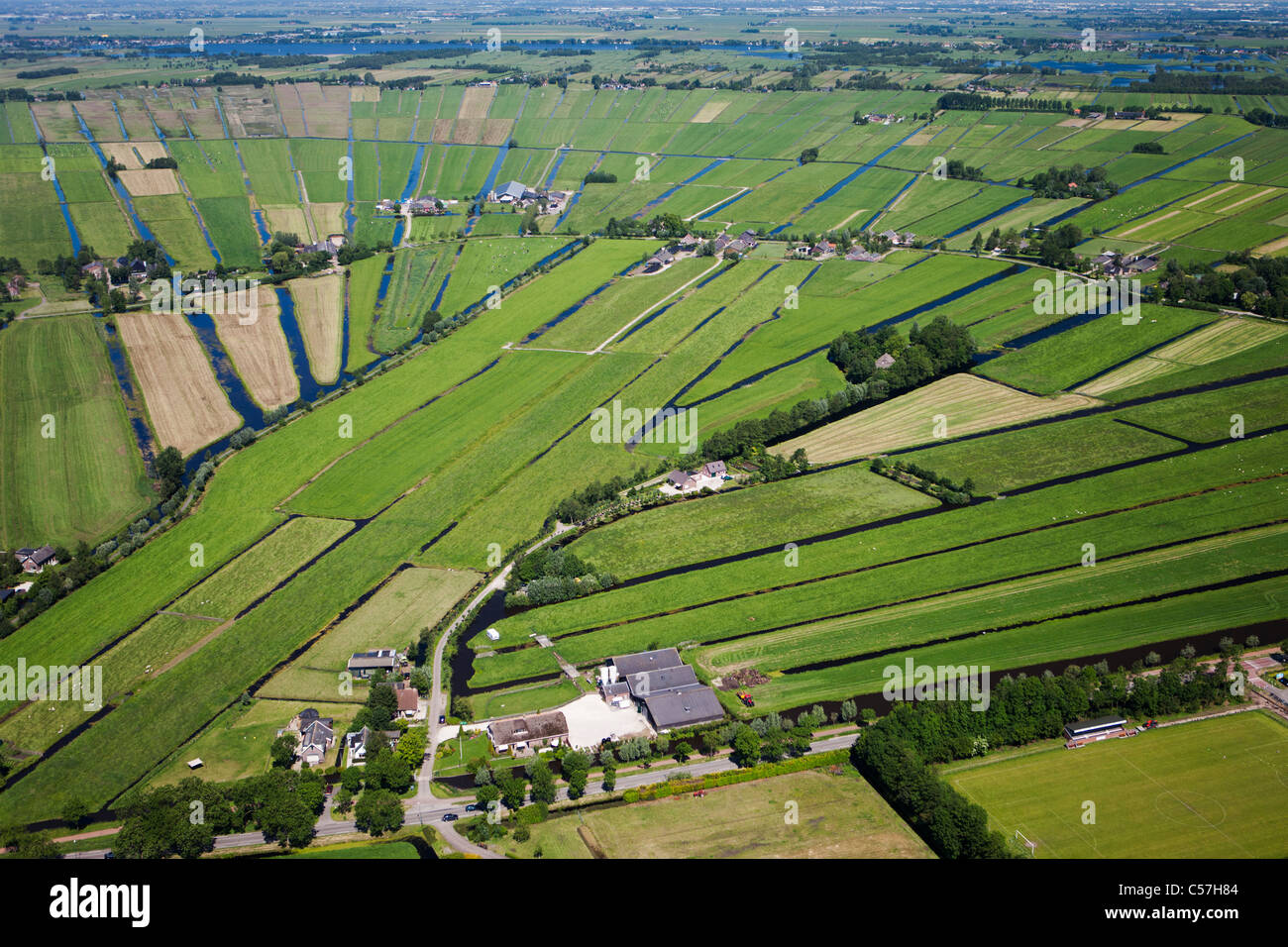 The Netherlands, Woerden, Farming land in polder. Aerial Stock Photo