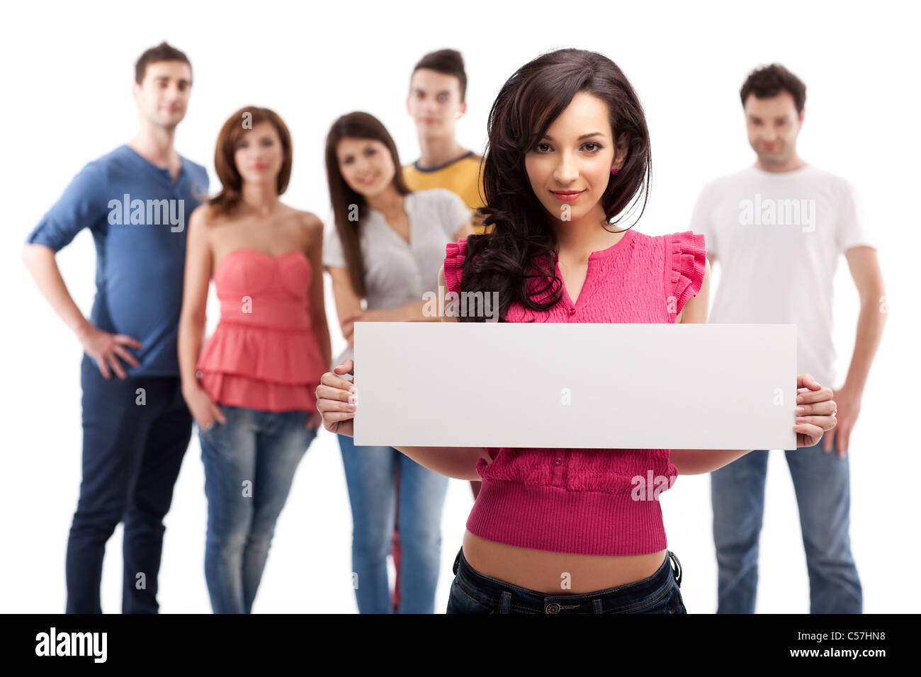 young brunette woman holding blank advertising banner Stock Photo - Alamy