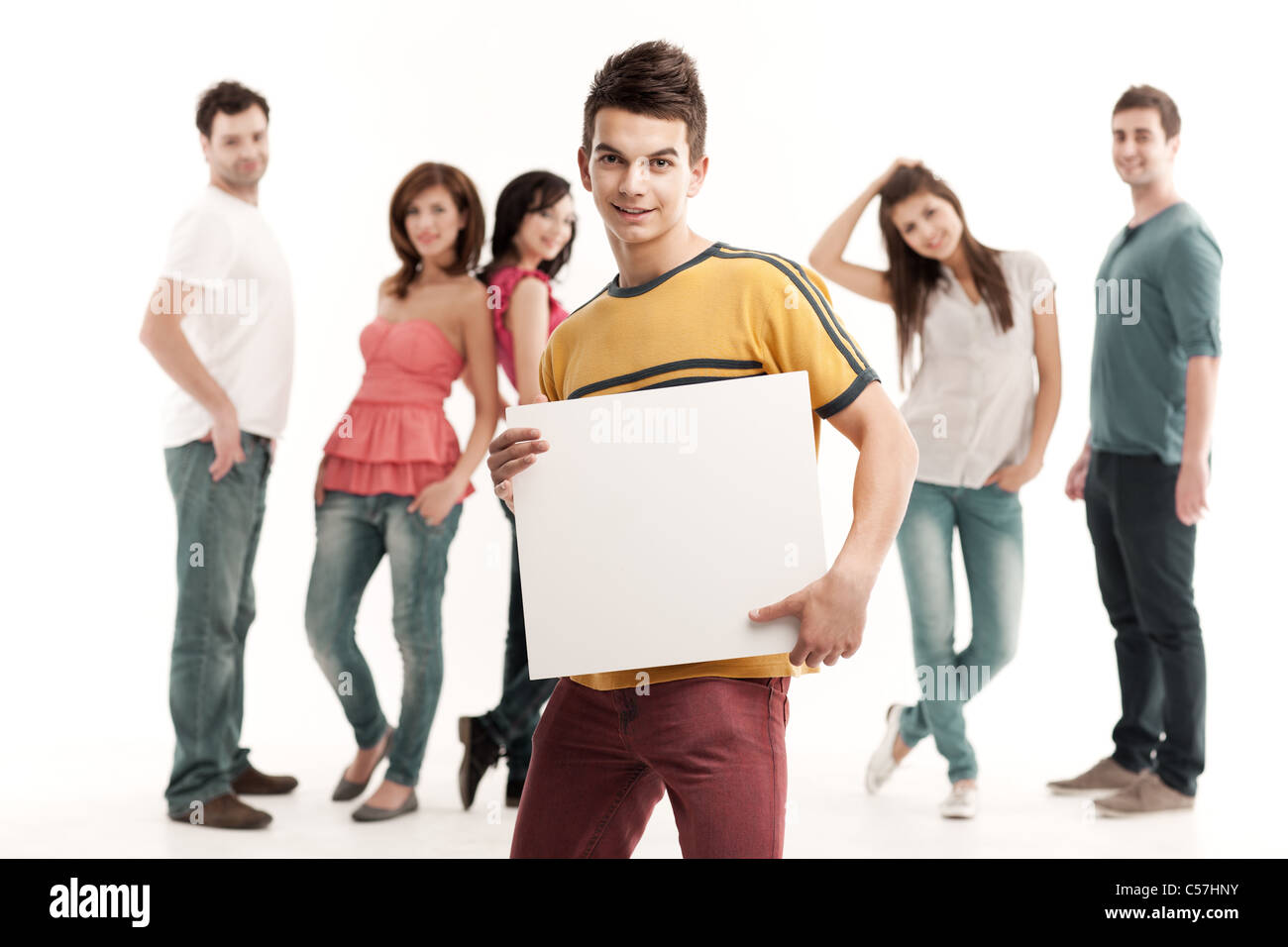 young handsome man holding blank advertising banner Stock Photo - Alamy