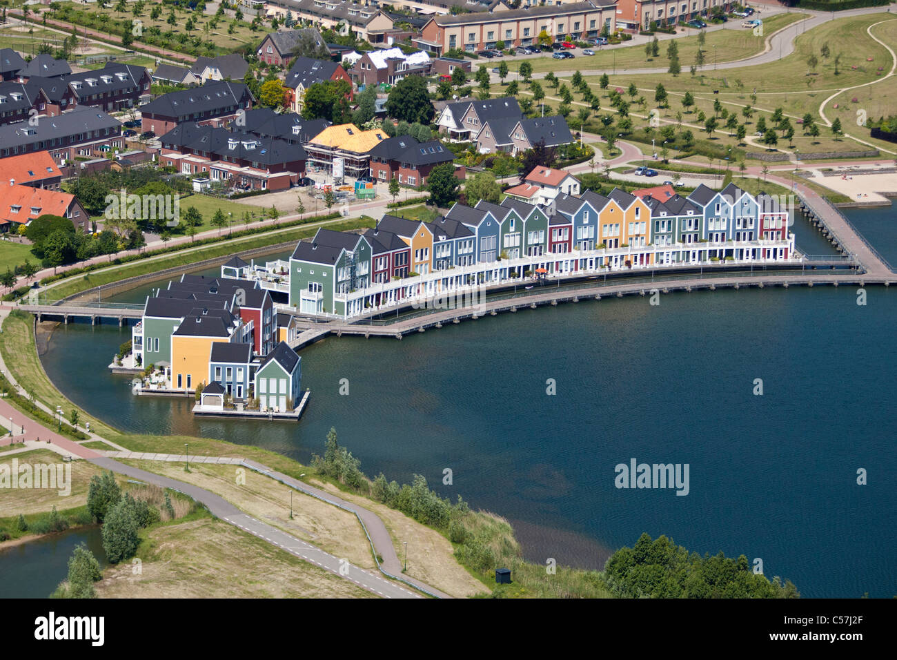 The Netherlands, Houten, Modern residential district. Aerial. Water villas. Stock Photo