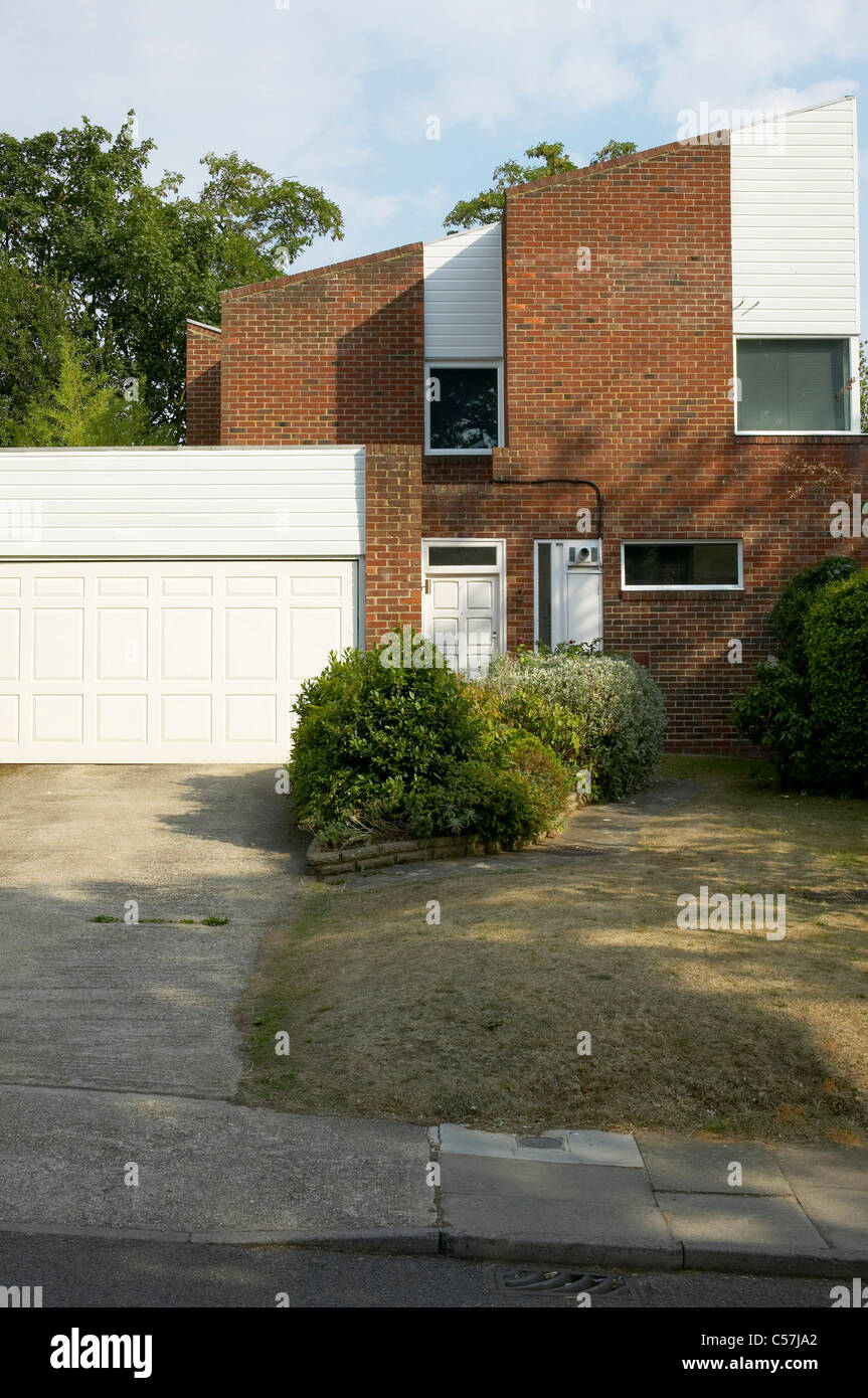 Housing, KingstonUponThames, Surrey. Half brick half timber clad house with garage Stock Photo