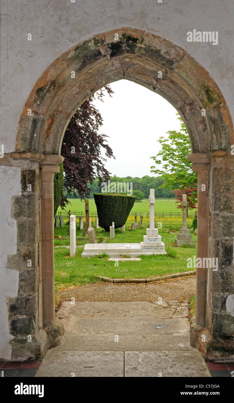 View through the south door (13th century) of St. Andrew's church West Stoke. Stock Photo