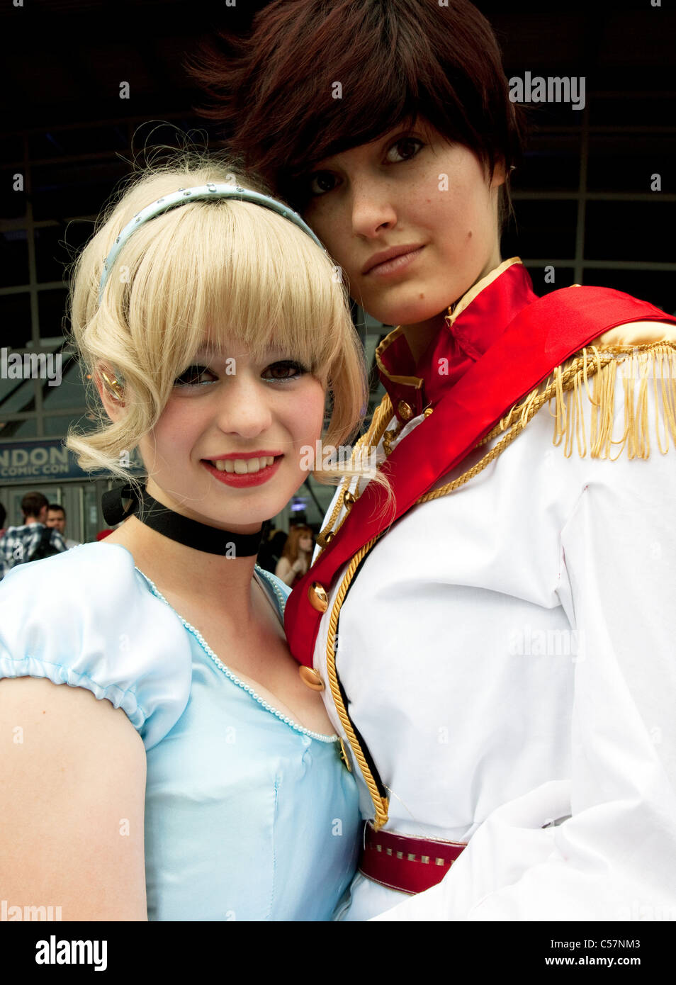 London Film & Comic Con 2011: Florence Roseberry-Haynes as Cinderella and Olivia Braddock as Prince Charming Disney characters Stock Photo
