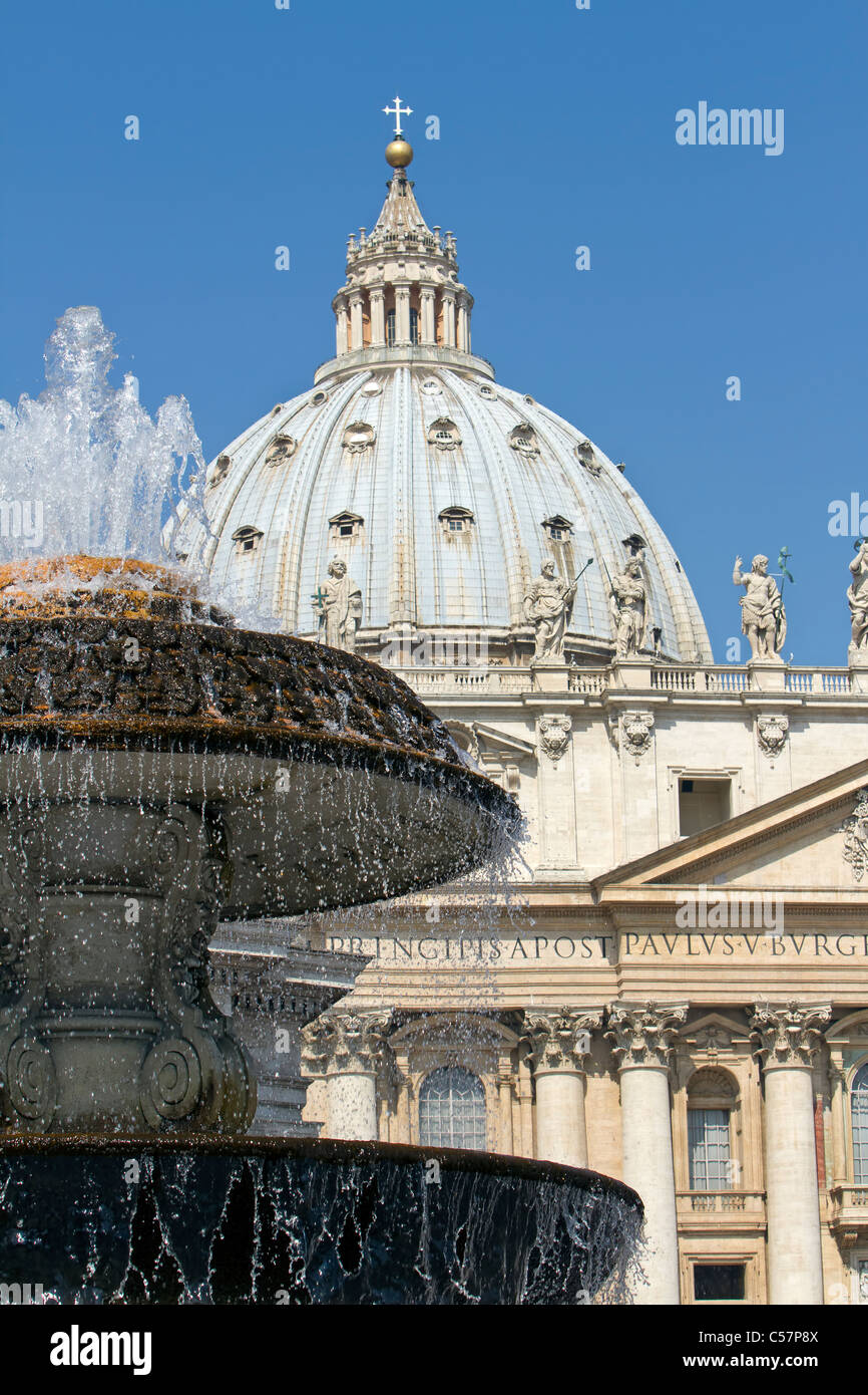 Vatican City Saint Peter's Square from center courtyard with beautiful fountain in the foreground. Stock Photo