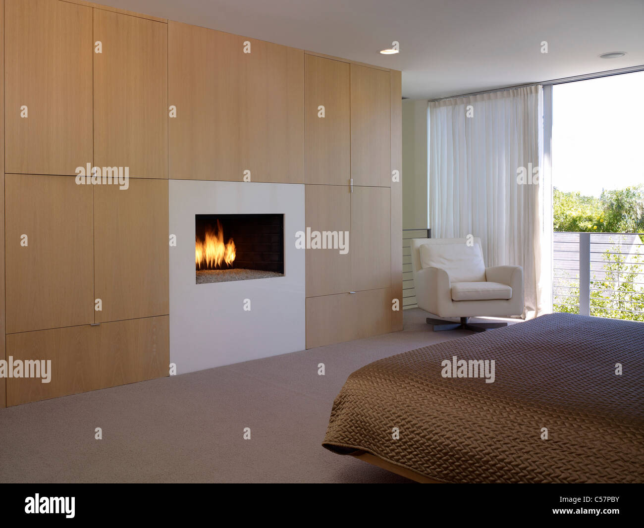 Modern Bedroom And Fireplace Set In Cupboards Lagatutta Residence
