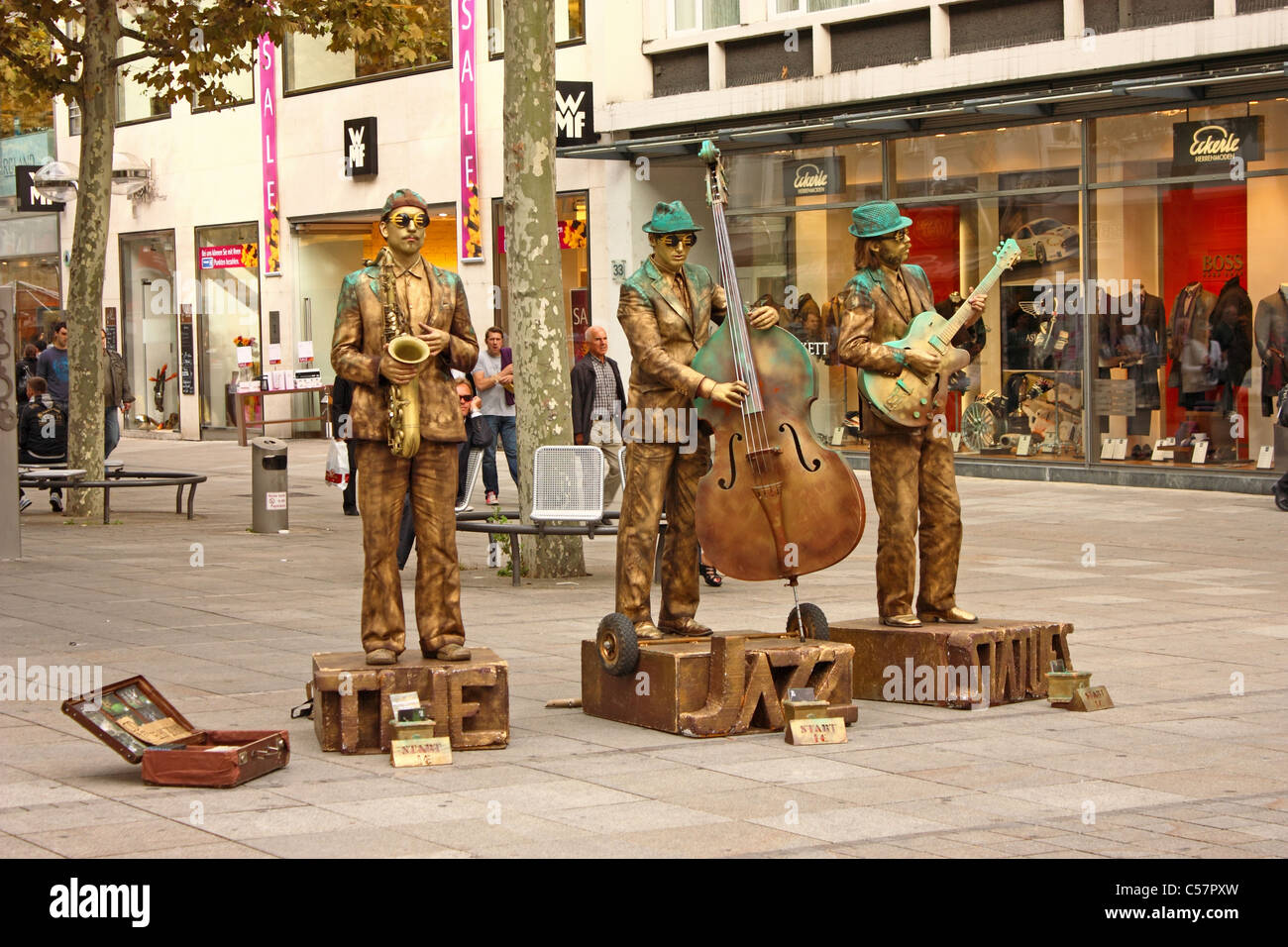 Street performers The Jazz Statues playing music on the street of